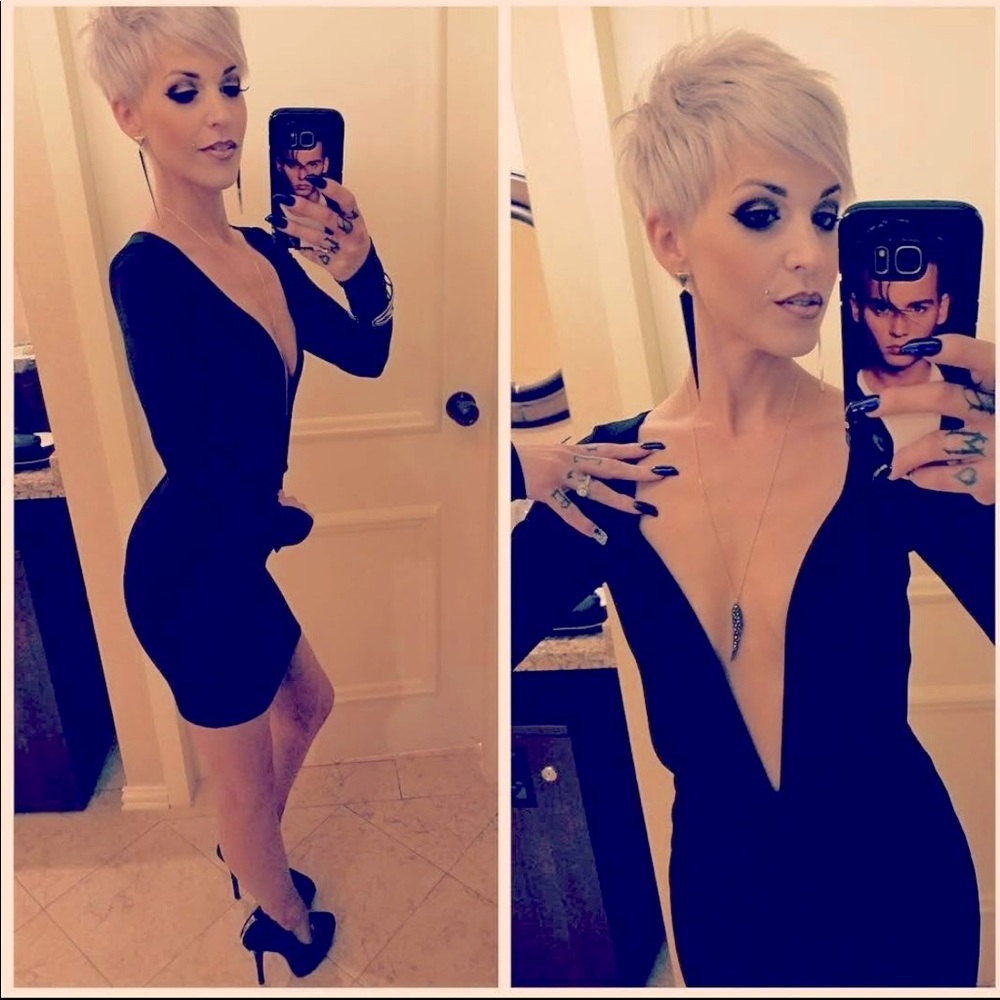 Black long sleeve mini dress with deep V plunge
